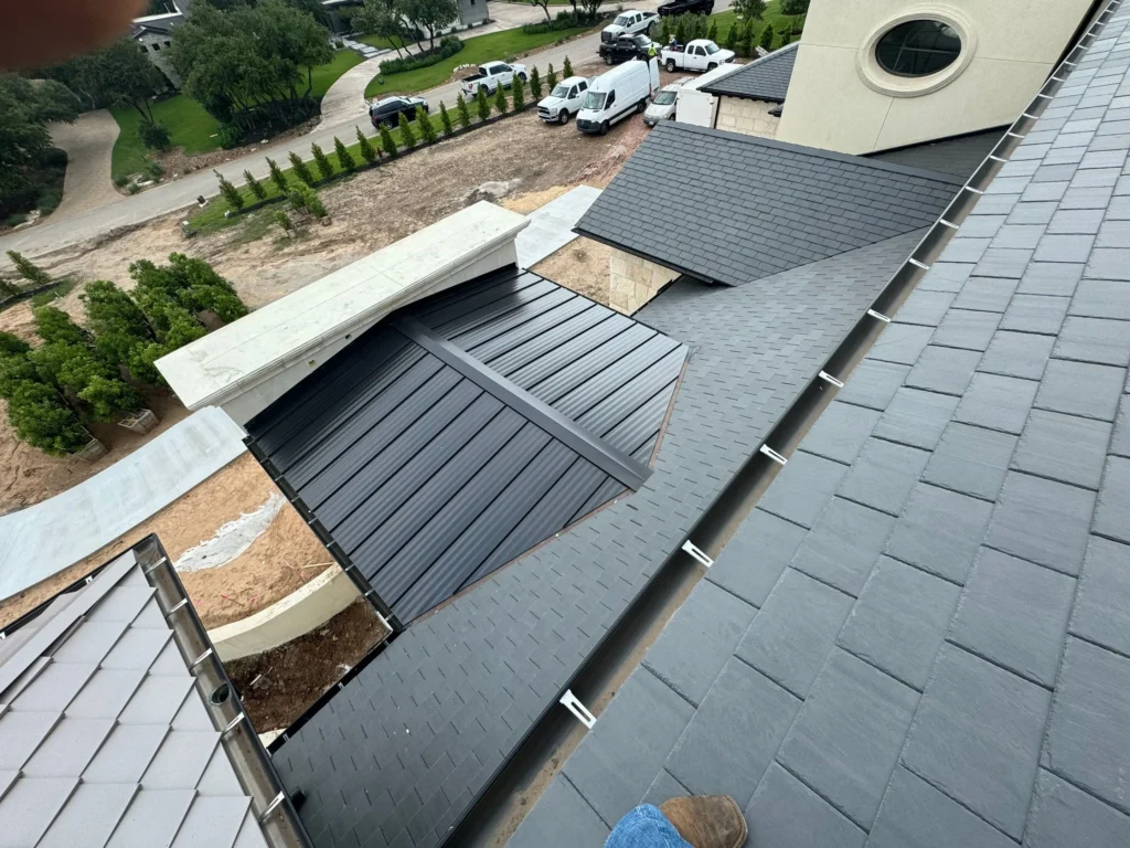 Close up structural view of clean roof valleys and modern flashing installations on a premium tile roof replacement project