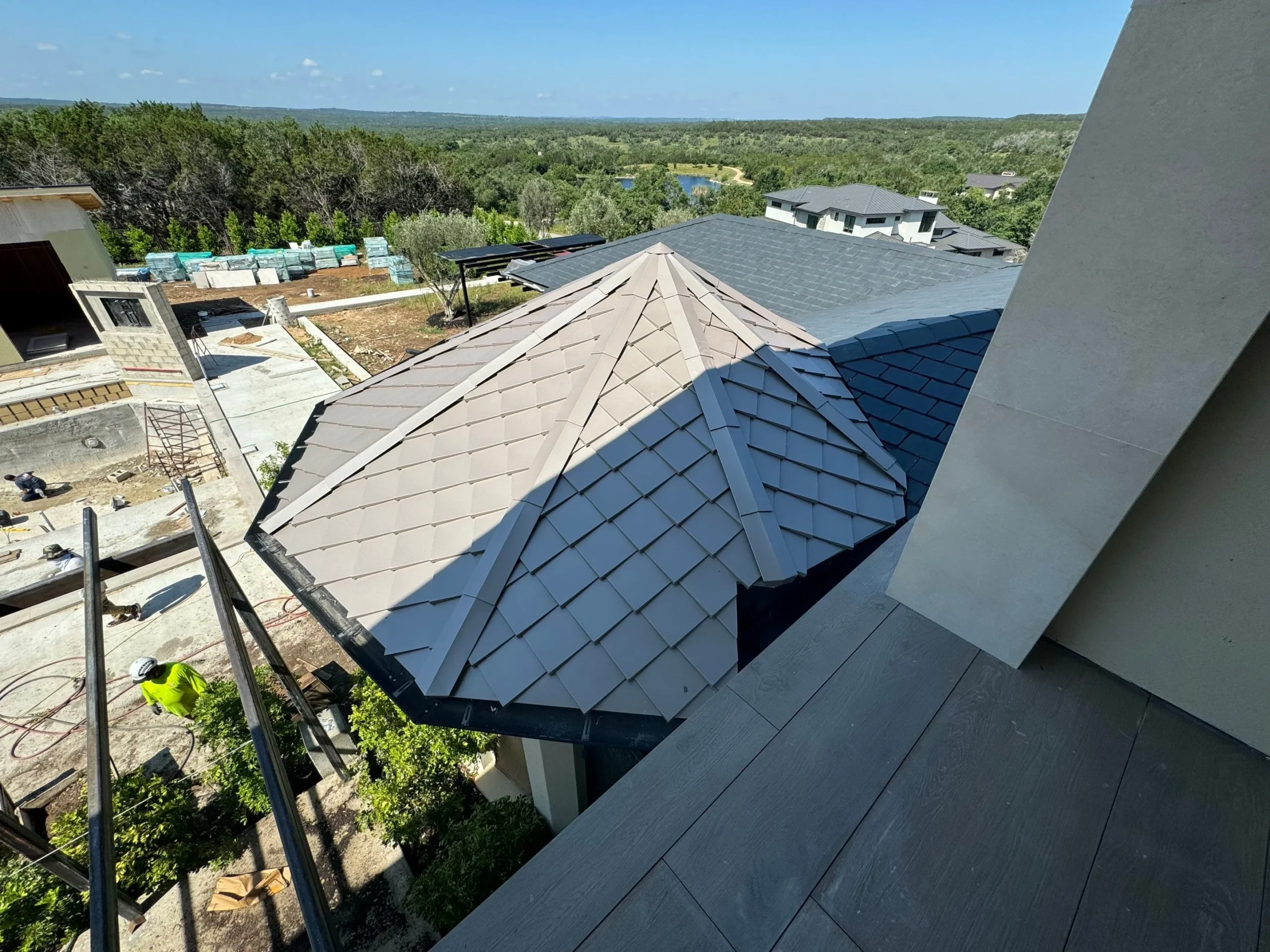 Finished architectural synthetic slate roof replacement completed by an expert roofing company in the Austin metro area